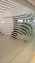 Load image into Gallery viewer, Glass partition with horizontal blinds in an office setting